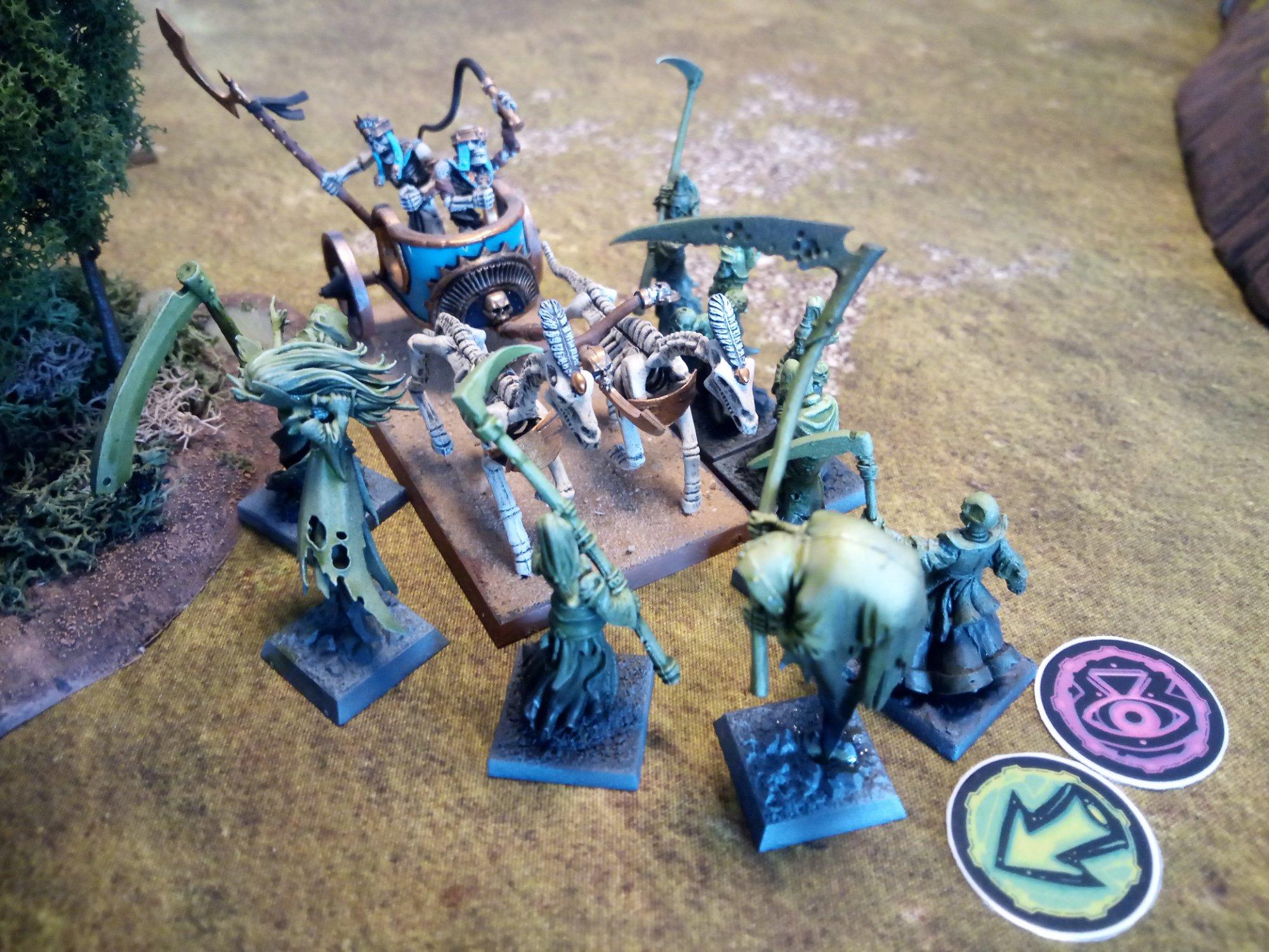 Vampiric Undead Wraiths charging Mummified Undead chariot in the Danse Macabre scenario for One Page Rules Age of Fantasy.