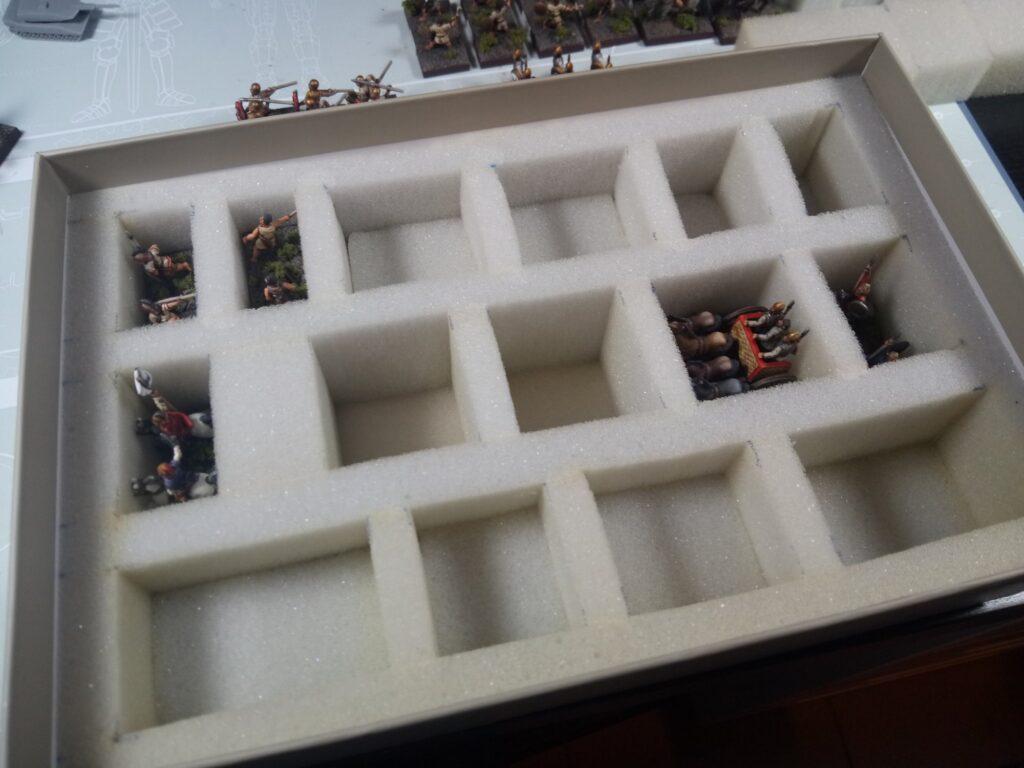 dry fitting the miniatures inside the DIY Miniature storage box.
