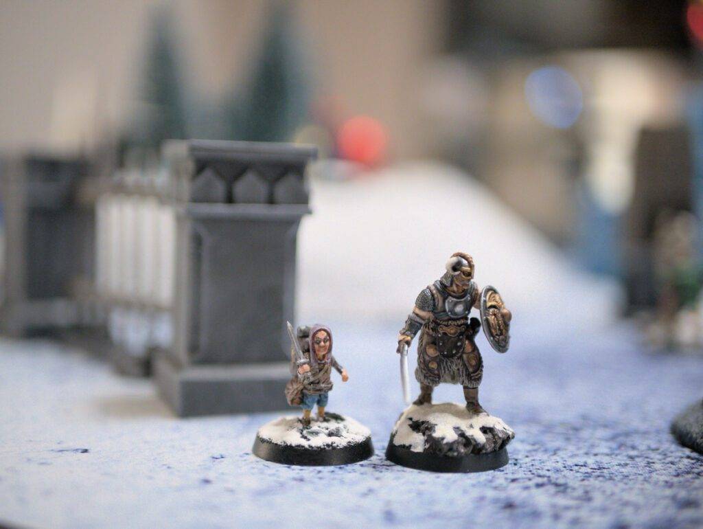 A captain and his packmule ina game of Frostgrave.